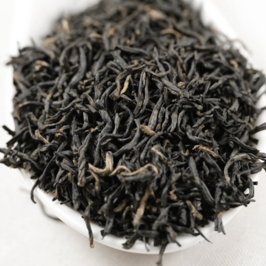 Chinese black keemun dry tea leaves closeup